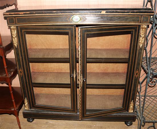 A Victorian ebonised bookcase